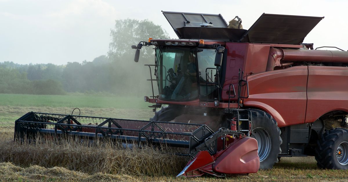 Combine Back Combine on a Cropland · Free Stock Photo