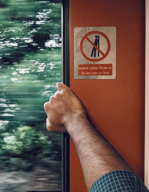 Man Hand on Train Window