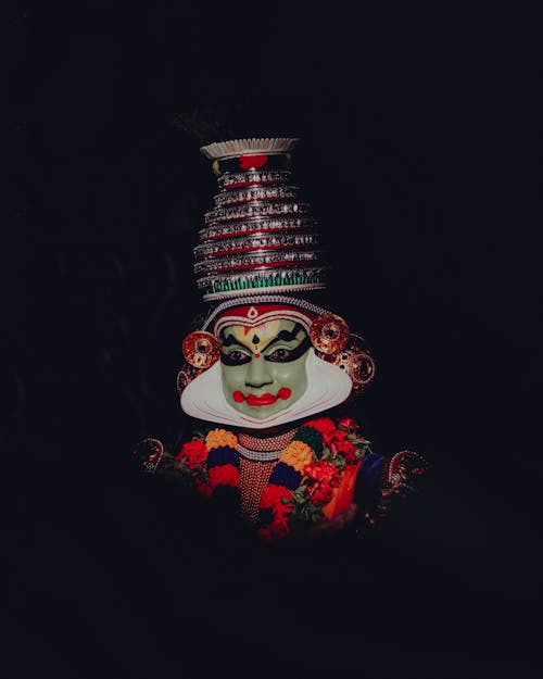 Dancer in Kathakali Mask