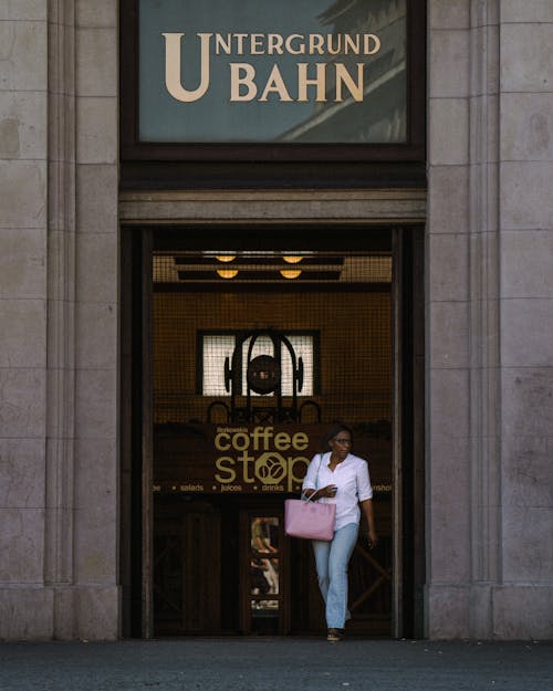 Woman in Subway Entrance