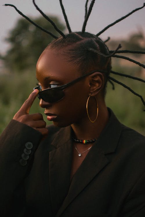 Woman in a Blazer and Sunglasses 