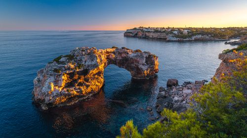 Free Breathtaking view of Es Pontas rock formation during sunset in Mallorca, Spain. Perfect for travel inspiration. Stock Photo