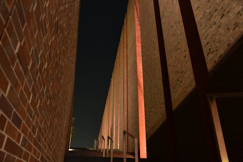 Sunlit Bricks on Buildings Walls