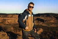 Man in a Mountain Valley in Summer