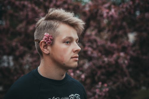 Free Portrait of Blonde Man Wearing Flowers  Stock Photo