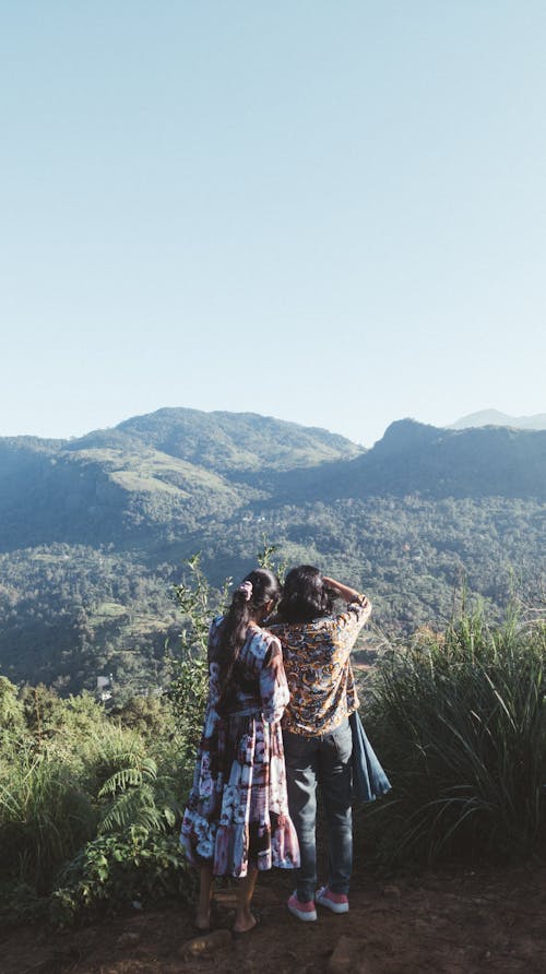 Tourists Admiring Mountain Views