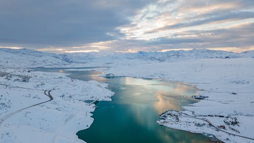 River Winding Through a Snow Covered Valley