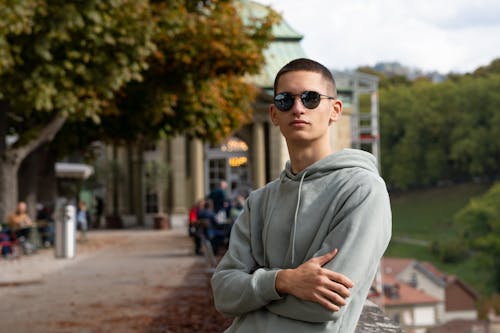 Man in Sunglasses and Hoodie