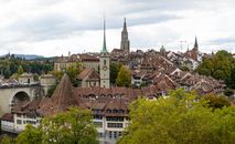 Explore the medieval architecture and charming rooftops of Bern, Switzerland's Old Town.