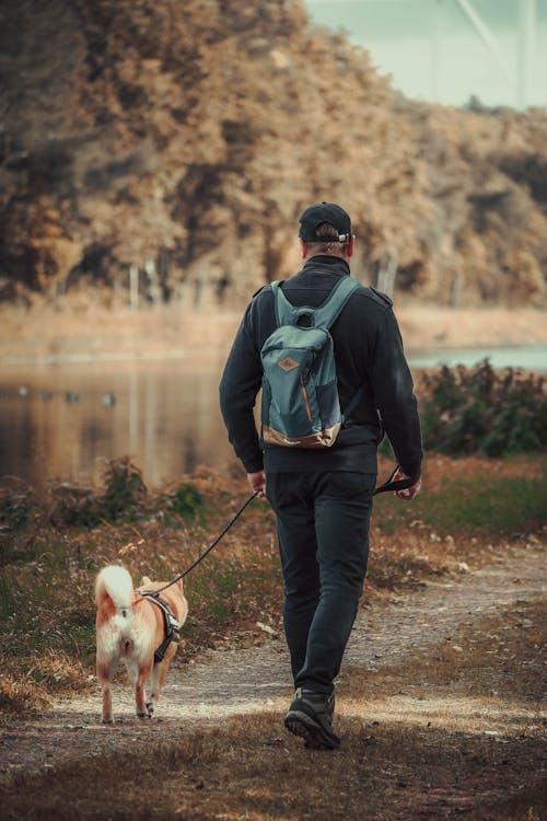 Walking the Dog on the Path Along the River