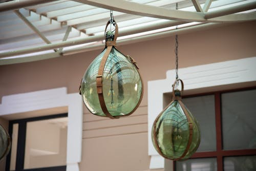 Decorative Carboys Hanging under a Canopy