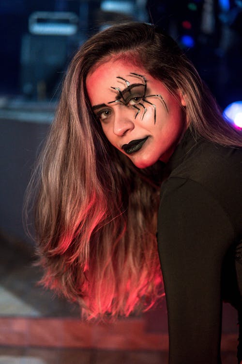 Portrait of Blonde Woman Wearing Halloween Makeup 