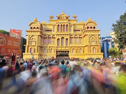 Blurred Crowd in Front of a Golden Temple