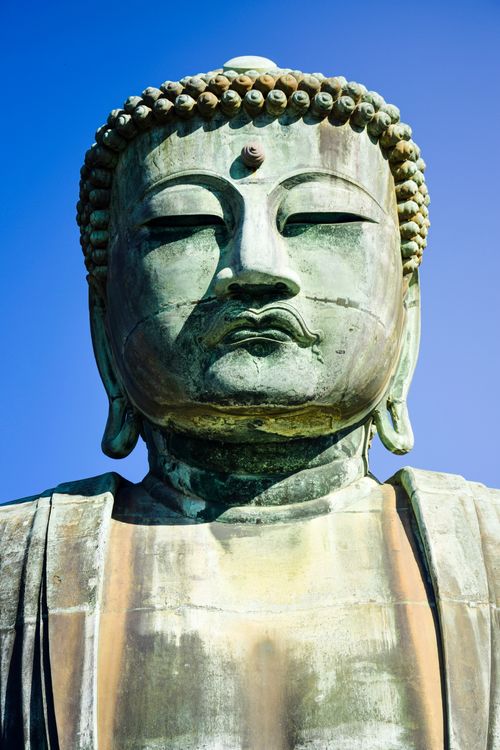 Free Close-up of the iconic Great Buddha statue at Kōtoku-in in Kamakura, Japan. Stock Photo