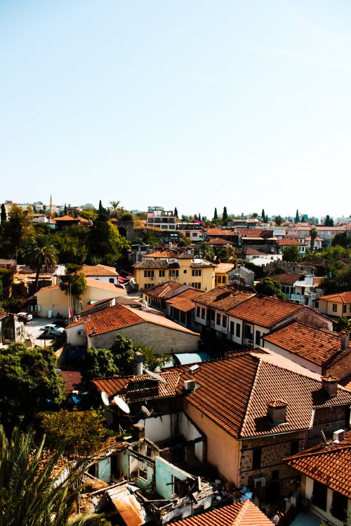Free A stunning aerial view showcasing Ottoman architecture and vibrant rooftops in a Turkish cityscape. Stock Photo
