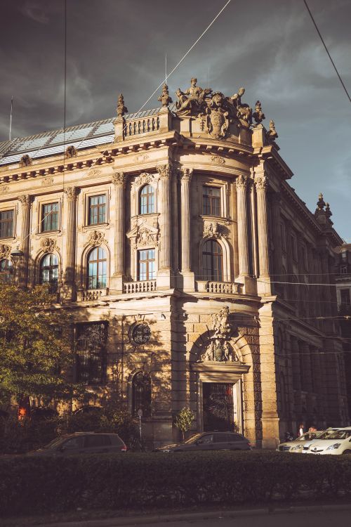 Free Historic building in Munich, Germany, capturing ornate facade details in warm sunlight. Stock Photo