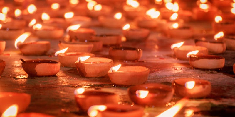 Diya lamps creating festive atmosphere during Hindu festival