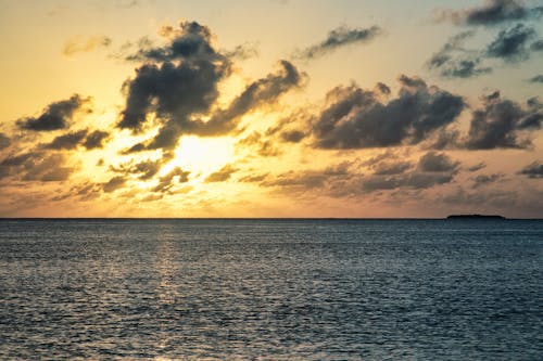 Yellow Sky over Sea at Sunset