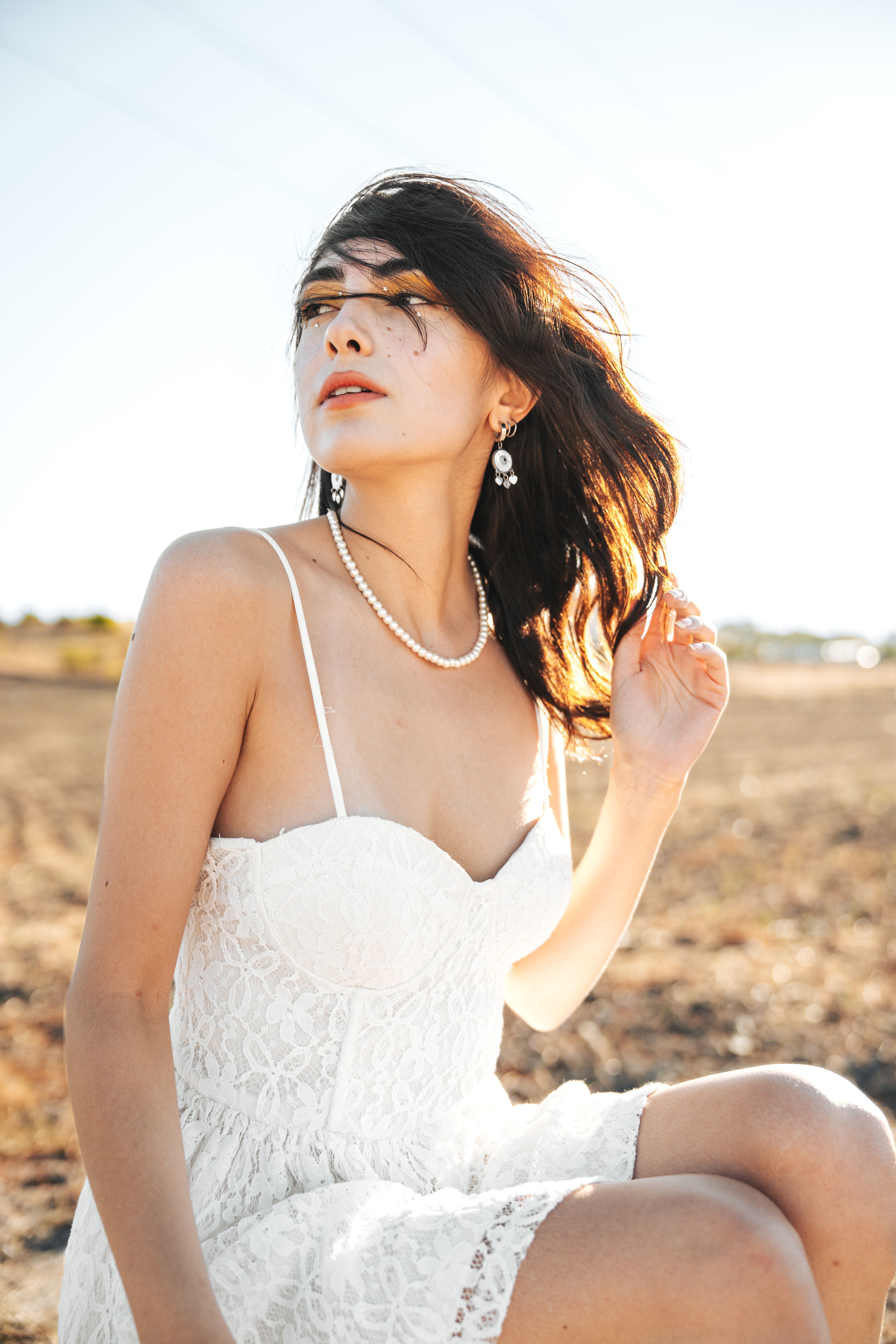 Model in White Lace Dress  Free Stock Photo