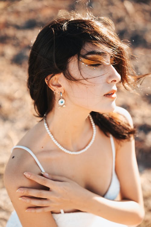 Portrait of a Young Woman with her Hair Blowing in the Wind 