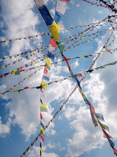 Strings of Colorful Bunting Flags on the Sky Background