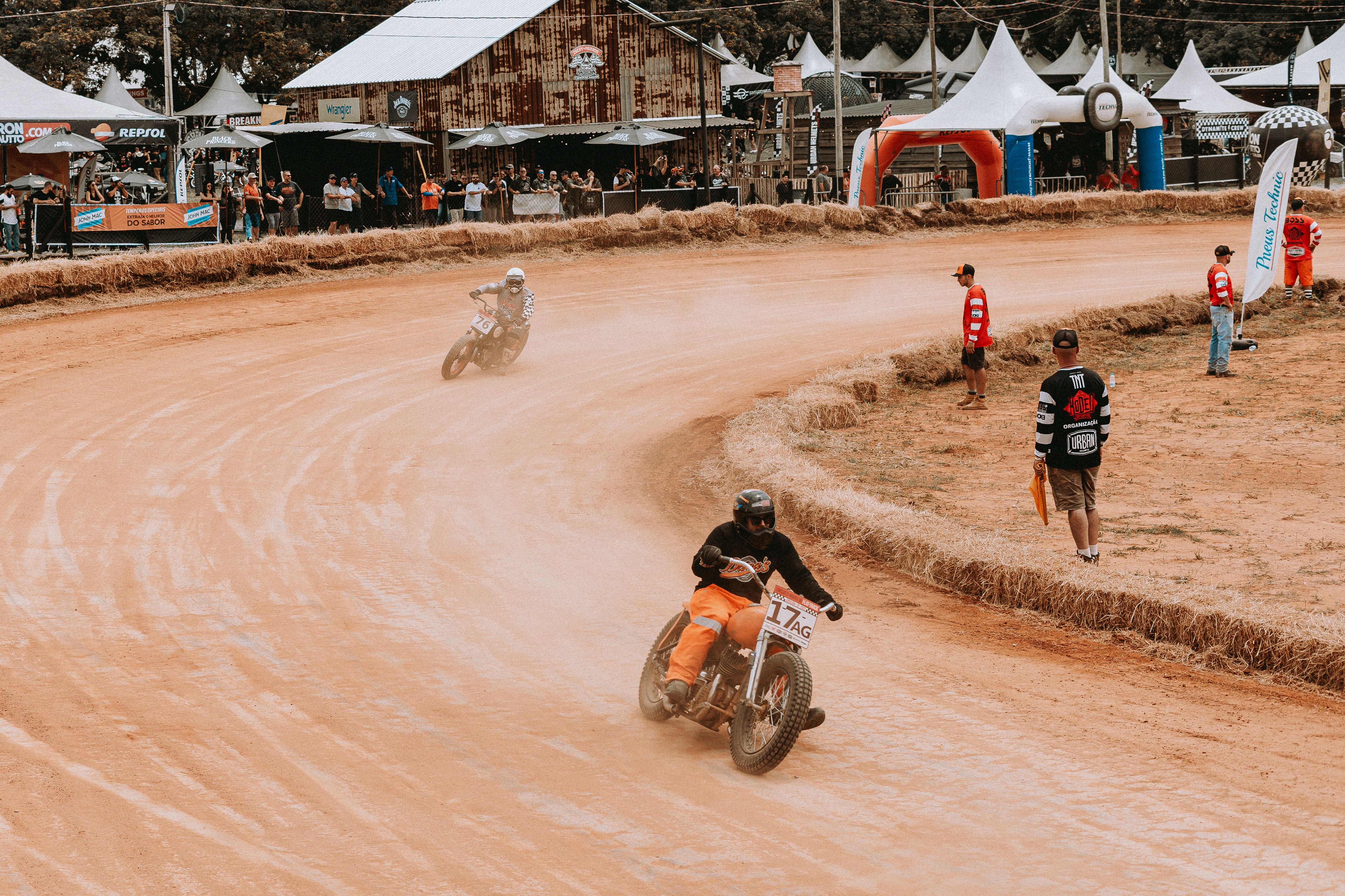 Riders on Motocrosses Racing on Track · Free Stock Photo
