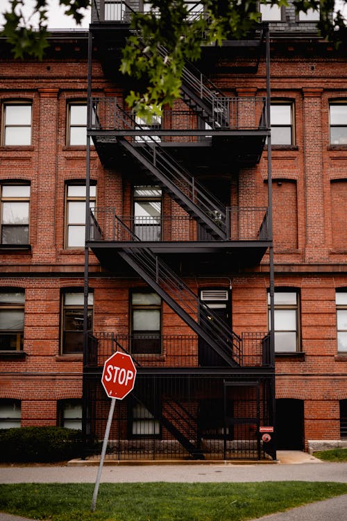 Fire Stairs at Red Brick Residential Building Facade