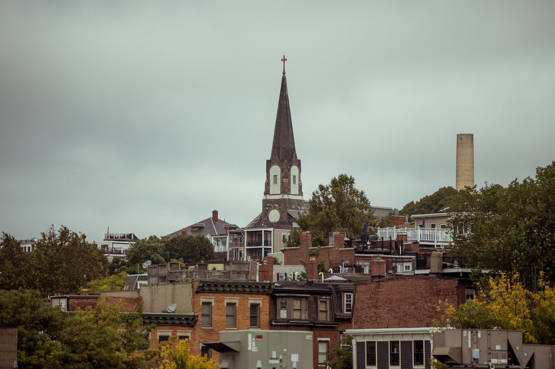 A residential street lined with multi-family homes in the New Bedford, Massachusetts metro area.