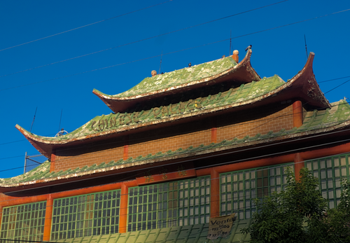 Free Chinese-style building in Torreón, Mexico with vibrant traditional rooftops. Stock Photo