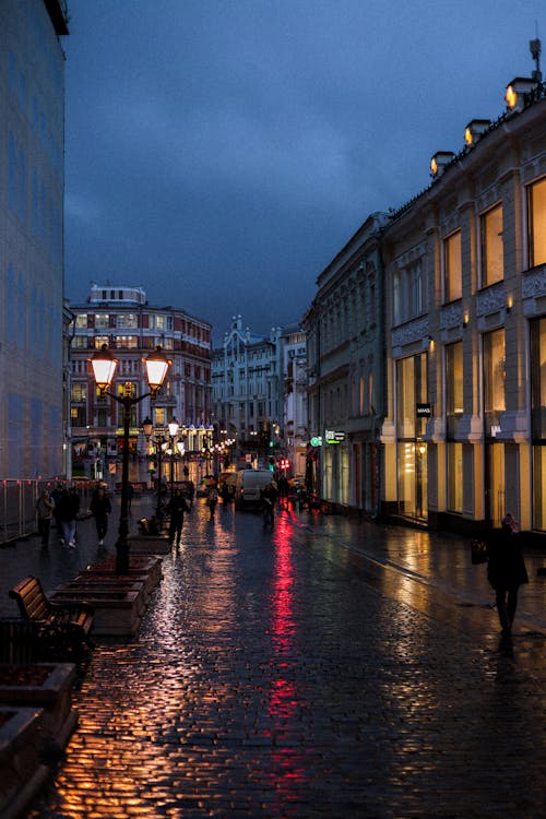 View of a Wet Street in City in the Evening 