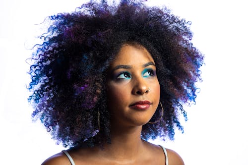 Woman with Afro Hair Looking Up