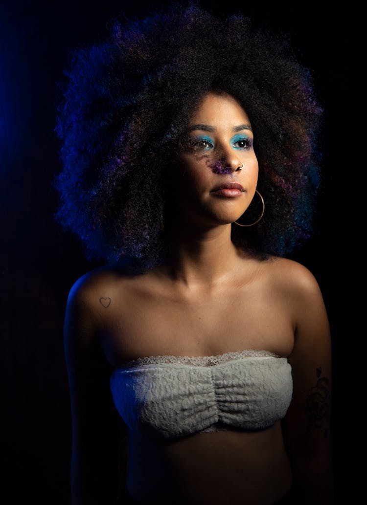 Portrait Of A Female Model Wearing An Afro