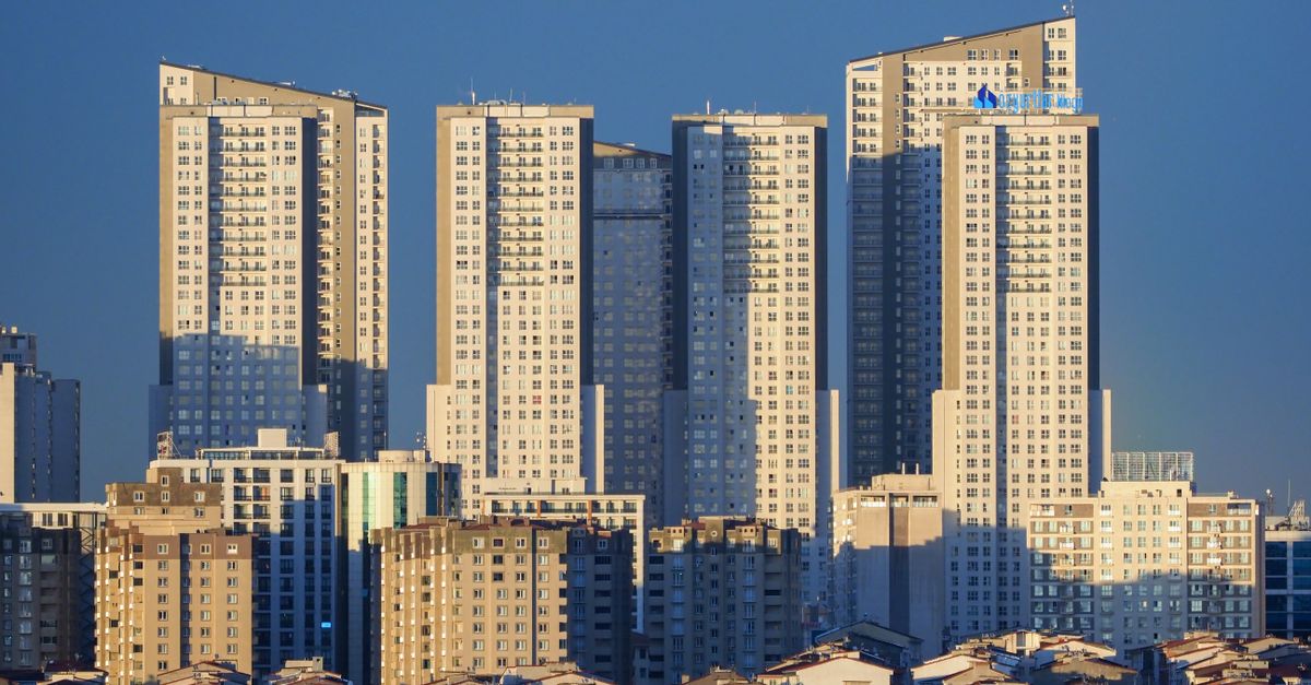 Stunning view of Istanbul skyscrapers towering over urban landscape at sunset.