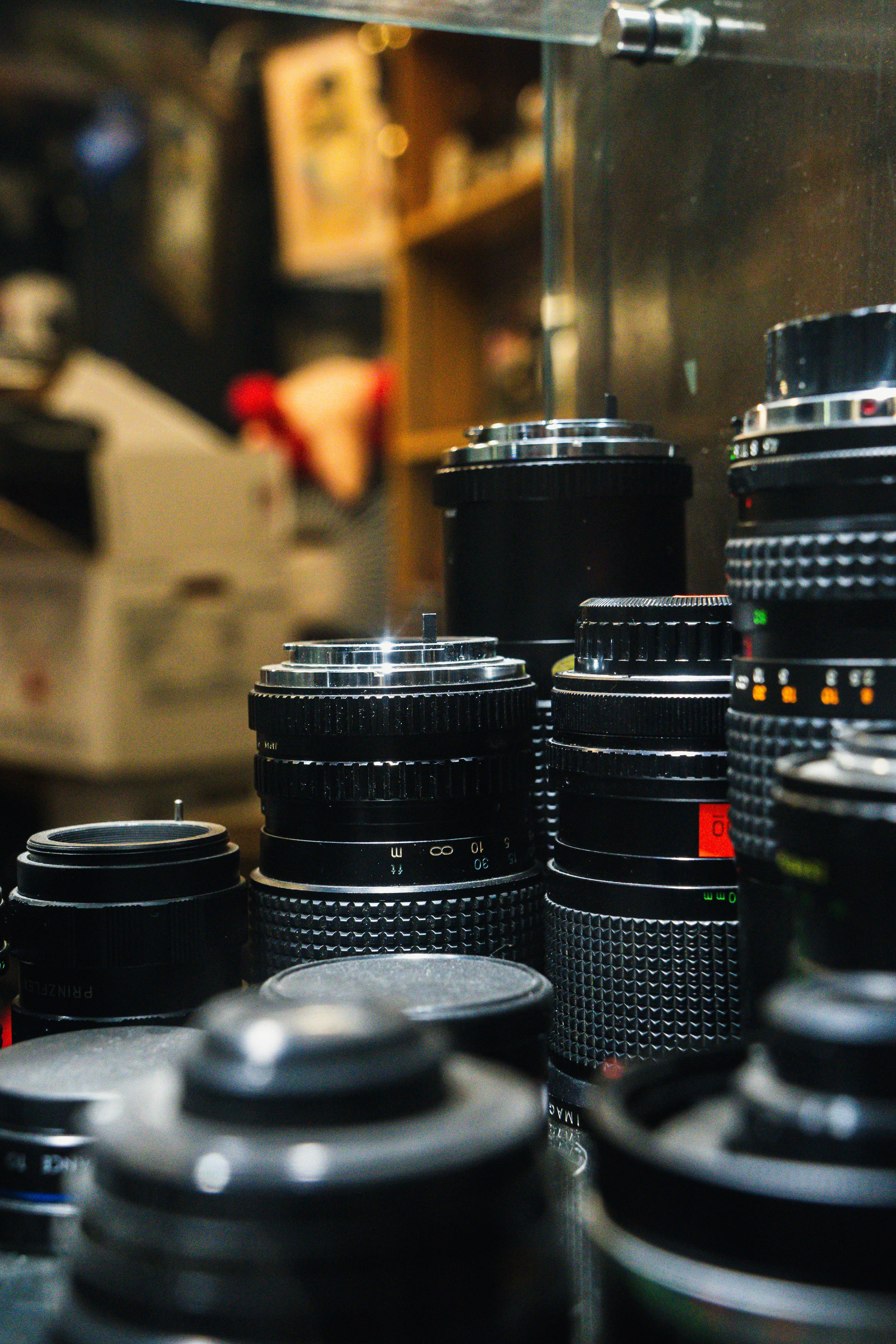 Diverse selection of camera lenses on display in a Calgary shop.