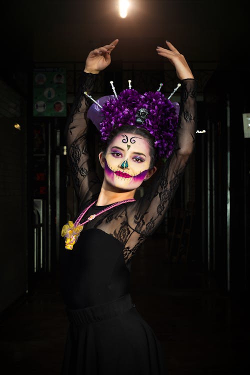 Portrait of Catrina with Arms Raised