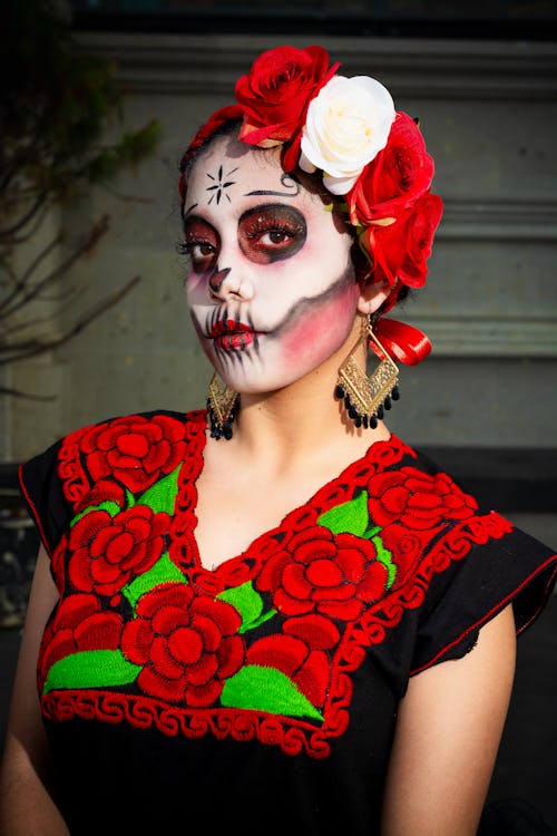 Woman in Floral Dress with Halloween Makeup