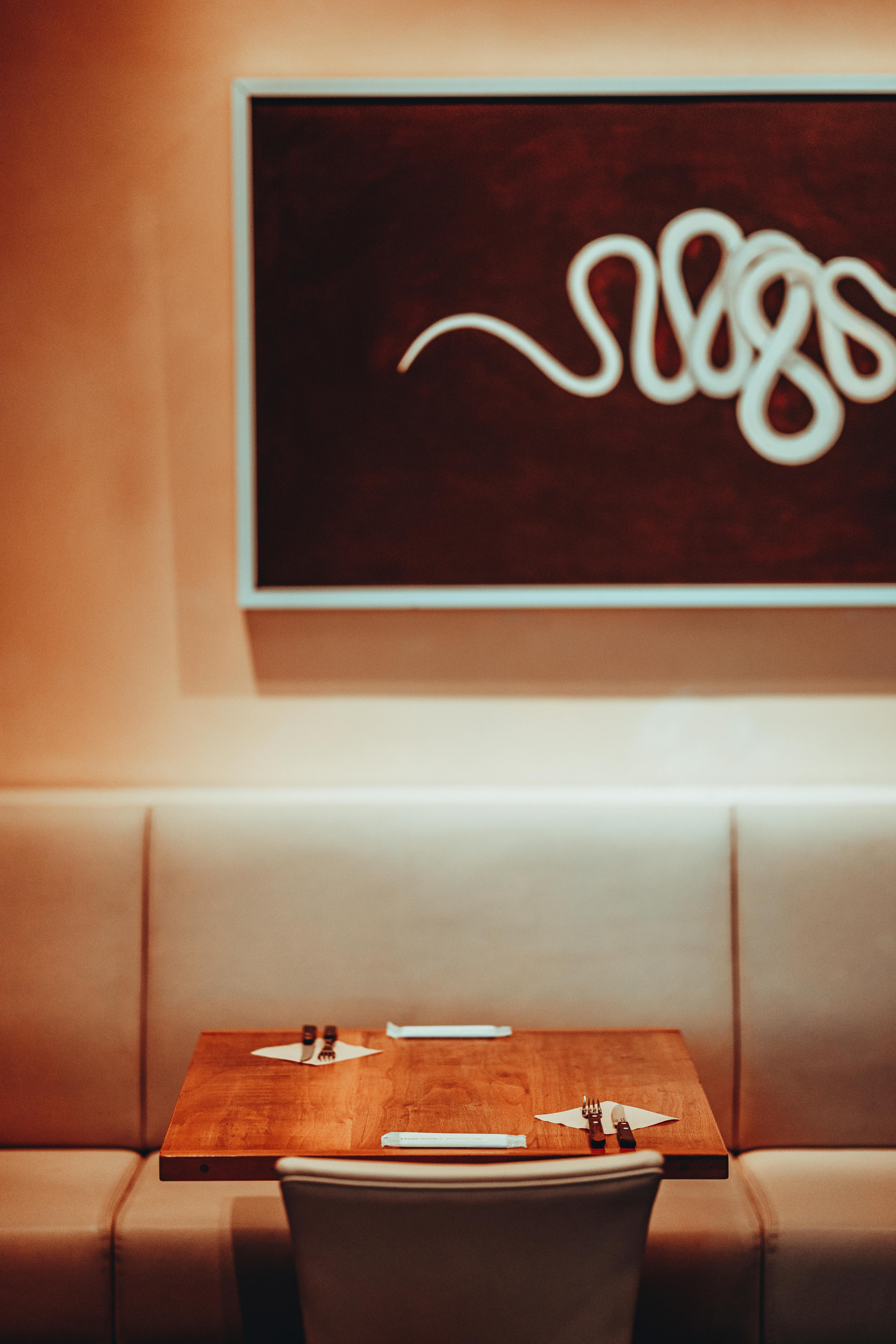 Cozy private booth inside a Japanese Internet cafe with a reclining chair