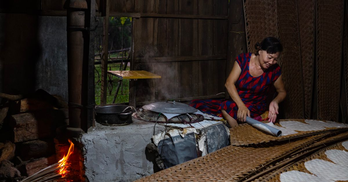 Mats Drying Rice Woman Laying Out Sheets of Handmade Rice Paper to Dry on Bamboo Mats ...