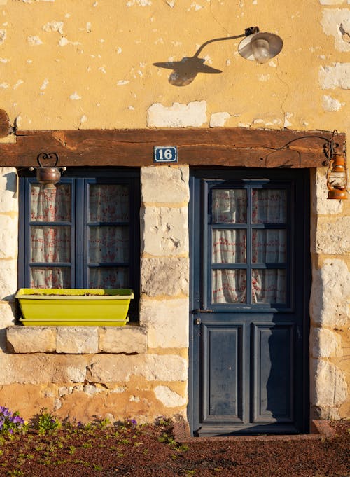 Exterior of an Old House with Damaged Walls 