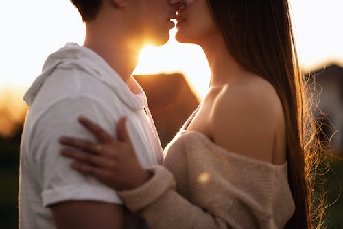 Couple Kissing in Sunlight 