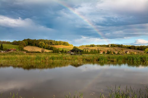 View of Rainbow over a Village 