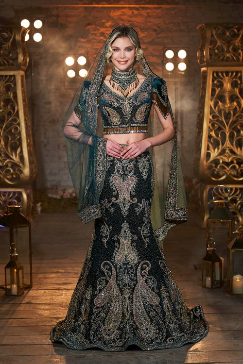 Free Model in a luxury embroidered dress, perfect for exquisite weddings. Stock Photo
