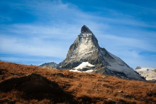 Free Capture of the iconic Matterhorn peak on a clear day, showcasing its majestic features. Stock Photo