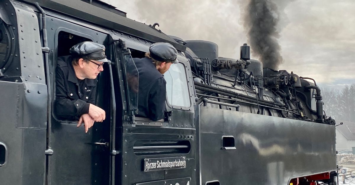 Man Train Engine Men Looking Out the Window of a Steam Locomotive · Free Stock Photo
