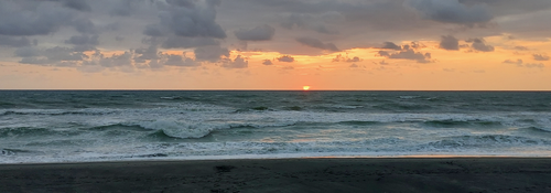 Free Panoramic sunrise at the beach Stock Photo