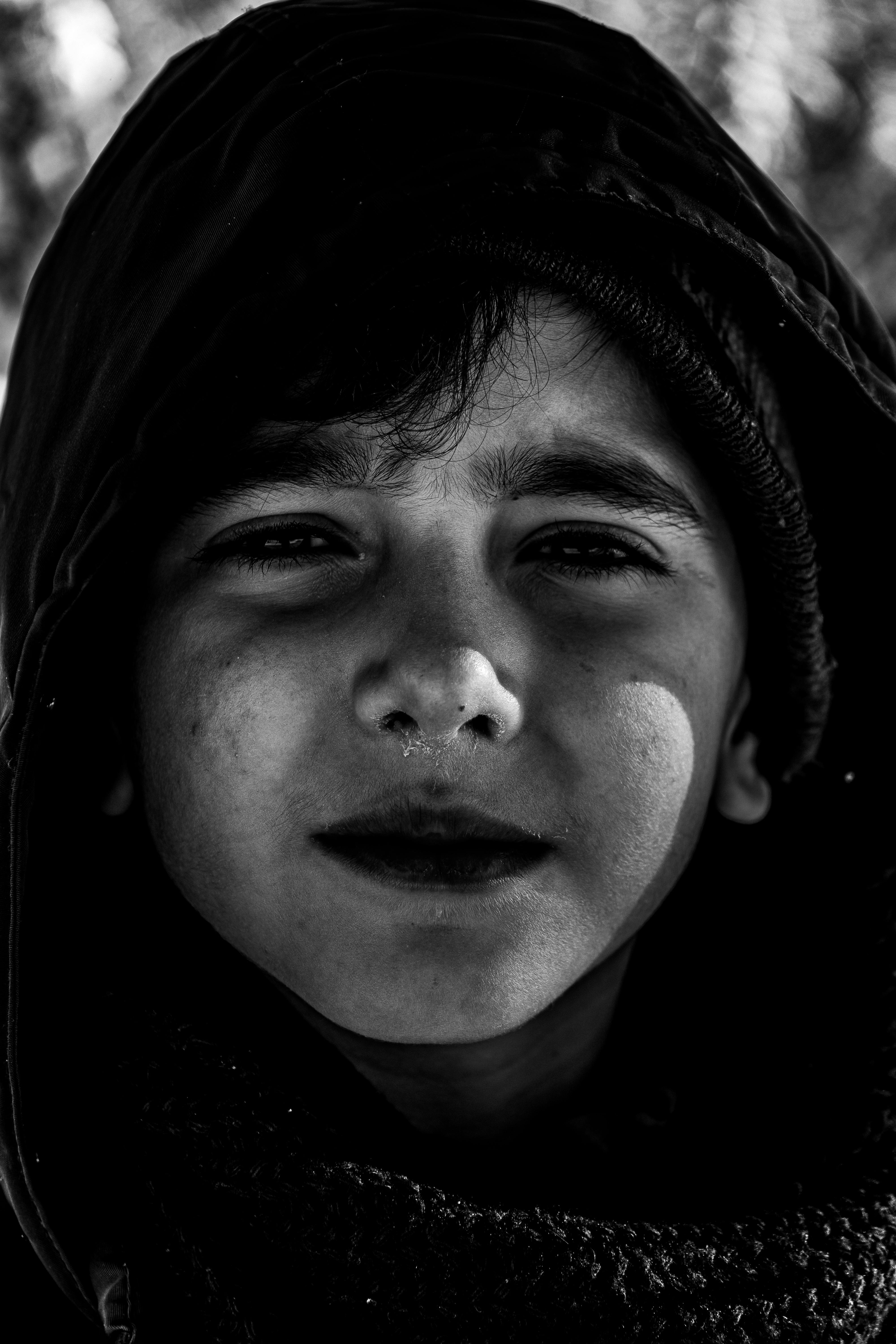 Black and White Portrait of a Kid Wearing a Hood · Free Stock Photo