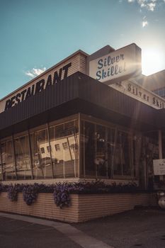 Retro restaurant building with classic signage, showcasing a nostalgic urban atmosphere.