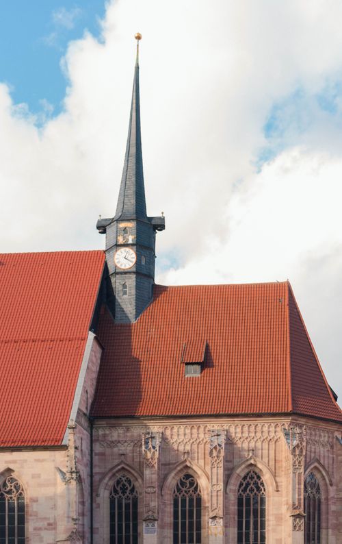 Free Close-up of the ornate church tower in Schmalkalden, showcasing stunning Gothic architecture. Stock Photo