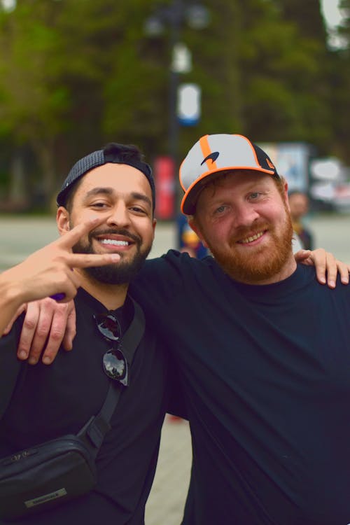 Two Male Friends Posing Together Outdoors