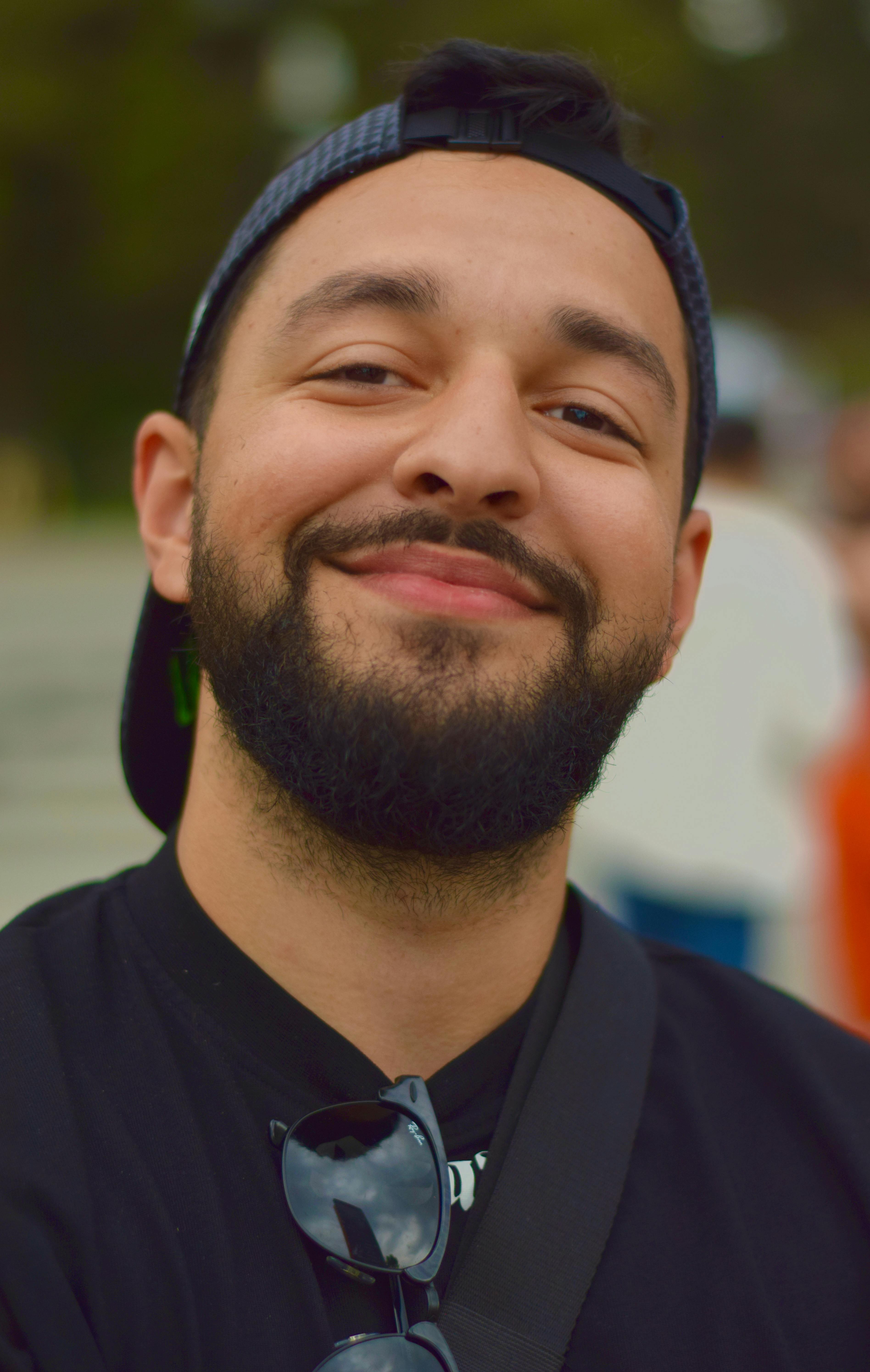Portrait of Man with a Beard Wearing a Cap · Free Stock Photo